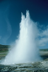 Iceland, Strokkur (The Churn) active geyser, near Reykjavik, erupts every 4-10 minutes.