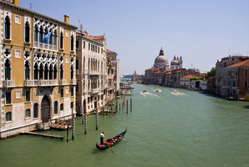 Obraz premium Italy, Venice. A gondola traveling down the Grand Canal.