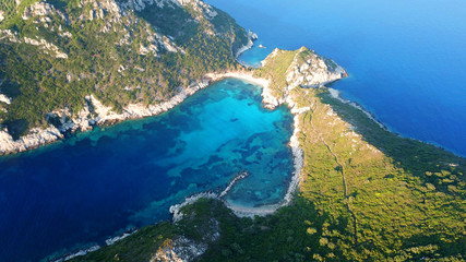 Fototapeta na wymiar Aerial drone photo of iconic paradise bay of Porto Timoni with tropical deep blue and turquoise clear sea, Corfu island, Ionian, Greece