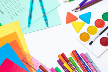 Back to school. Preparing for the school year. Stationery isolated on a white background. Bright stationery. Hello school. Stationery layout on a white background.