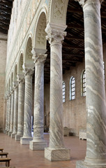 Italy, Ravenna. A row of marble columns in the Church of St. Apollinare.