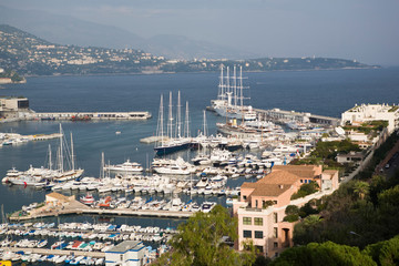 Small sculpture at the Palace and fortress museums of Monte-Carlo in Monaco. Coastline of Southern...