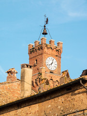 Italy, Tuscany, Pienza. Clock tower in the small town of Pienza.