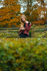 Gorgeous girl posing at the autumn forest