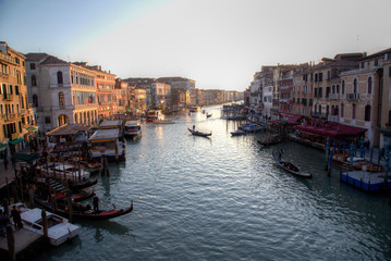 Fototapeta na wymiar View of Grand Canal, Gondolas and boats from Rialto Bridge, Venice Italy