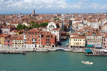 Fototapeta na wymiar Italy, Venice. Typical canals, bridges and architecture