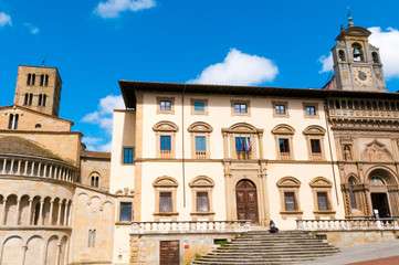 Fototapeta na wymiar Fraternita dei Laici and Church of Santa Maria della Pieve, Piazza Vasari or Piazza Grande, Arezzo, Tuscany, Italy