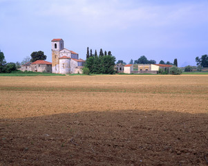 Italy, Caprona. The fields lie fallow outside this small farm in Caprona, Tuscany, Italy.