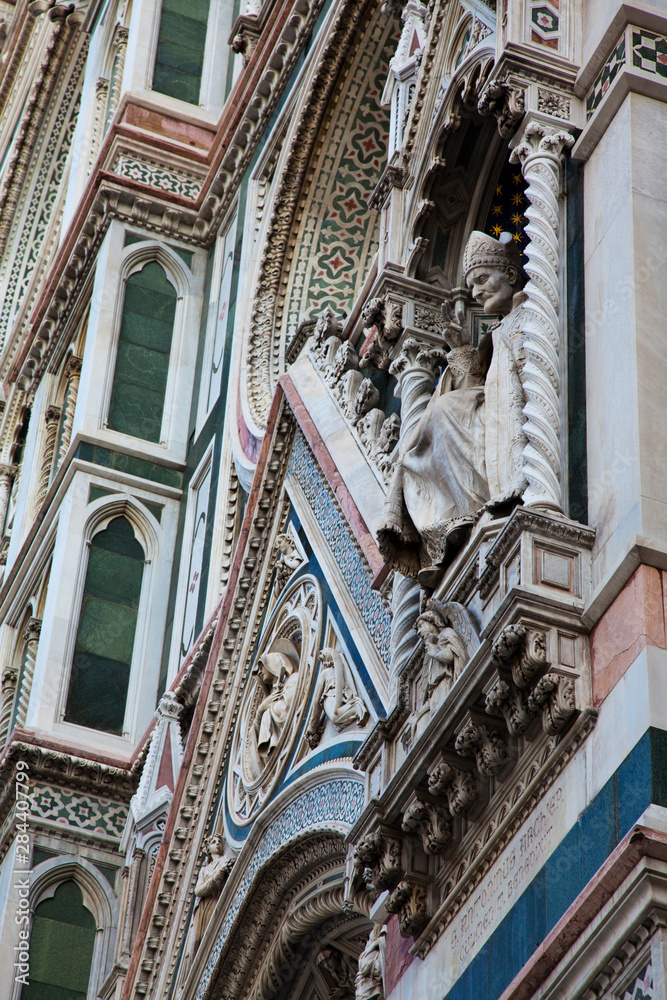 Poster afternoon light on the front face of the duomo of florence.