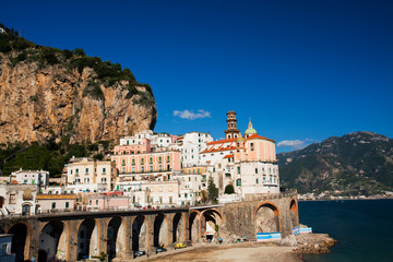 Atrani's church of holy Maria Maddalena with the city surrounding the church.