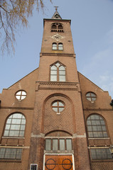 The Netherlands (aka Holland), Volendam. Popular picturesque fishing village on the IJsselmeer. Local church.