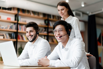 multinational call center office with tech support workers