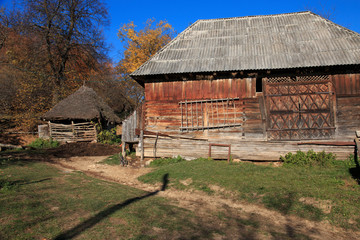Romania, Maramures County, Dobricu Lapusului. Typical farm house, barn