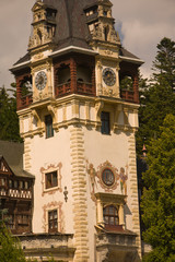 Fototapeta na wymiar Romania, Sinaia. The clock tower at Peles Castle. 
