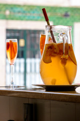 Portugal, Lisbon. White wine Sangria drink with fresh fruit.