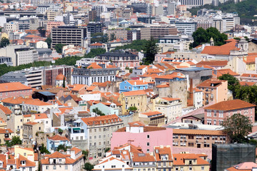 Fototapeta na wymiar Portugal, Lisbon. Street as seen from the walls of the Sao Jorge Castle is a Moorish castle on hilltop overlooking the historic center of Lisbon and Tagus River.