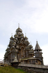 Fototapeta premium Russia, Lake Onega, Kizhi Island. Historic 22-domed Transfiguration Church built in 1714 without a single nail. UNESCO site. 