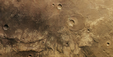 Close-up shot of the yellow moon with craters on the surface.Texture or background