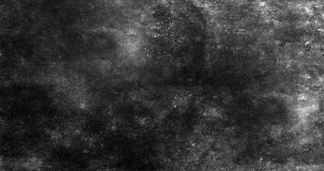 Dirty and covered in black spots a concrete wall.Texture or background