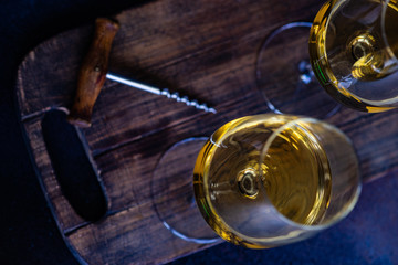 Glass of wine on rustic background