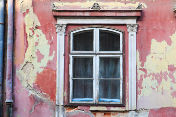 Romania, Brasov, Old town, window with peeling paint.