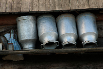 Romania, Bucovina, Campulung Moldovenesc, local shepherd and craftsman cans from milking.