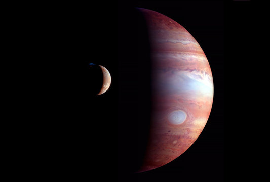 Jupiter with the satellite Europe, on a dark background. Elements of this image were furnished by NASA