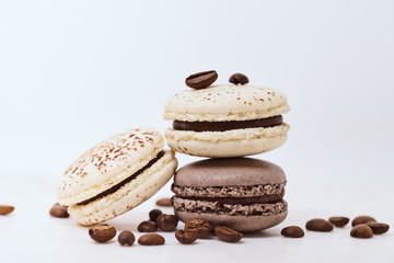 Few colored macarons on a white background