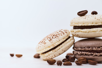 Few colored macarons on a white background