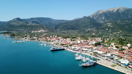 Fototapeta na wymiar Aerial drone bird's eye view photo of iconic port of Nidry or Nydri a safe harbor for sail boats and famous for trips to Meganisi, Skorpios and other Ionian islands, Leflkada island, Ionian, Greece