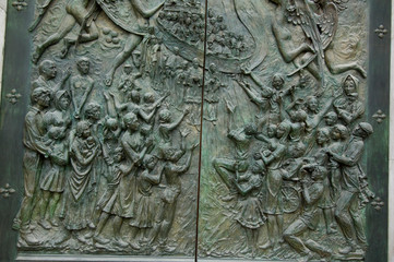 Spain, Madrid. Neo-Gothic Cathedral Almudena (aka Cathedral de la Almudena), cathedral doors.