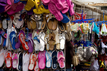 Russia, Yaroslavl, Golden Ring city on the banks of the Volga. Typical local market, shoes. 