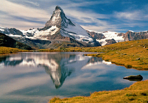 Switzerland, Matterhorn. A small tarn reflects the Matterhorn above Zermatt in Switzerland.