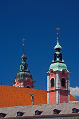 Fototapeta na wymiar Church rooftop and bell towers, Ljubliana, Slovenia