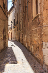 Fototapeta premium Spain, Balearic Islands, Mallorca. Palma. Back narrow streets.