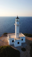 Aerial drone bird's eye view photo of iconic lighthouse in Cape Lefkada the Southest part of the island, Ionian, Greece