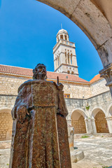 Fototapeta na wymiar Croatia, Hvar. Interior courtyard of Franciscan monastery. 