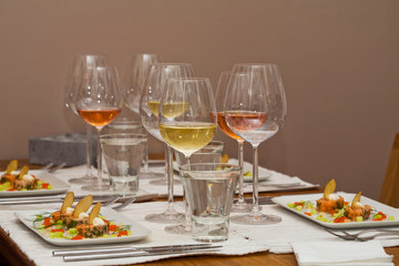Stockholm, Sweden - Table setting with seafood and wine.