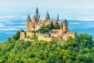 Hohenzollern Castle on mount top, Germany. Scenic view of Burg Hohenzollern in summer. Landscape of Swabian Alps with Gothic castle. © scaliger