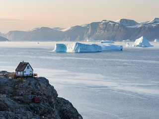 Small town of Uummannaq, northwest Greenland. Background the glaciated Nuussuaq (Nuussuaq) Peninsula.
