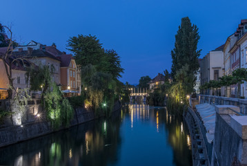 Fototapeta na wymiar Slovenia, Ljubljana, Ljubljana River at Dawn