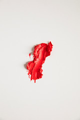 Beauty product - red lipstick smear