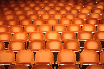 Fototapeta premium Empty orange seats in auditorium.