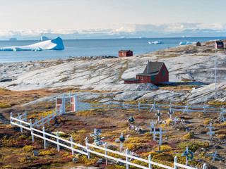 The cemetery. Inuit village Oqaatsut (once called Rodebay) located in the Disko Bay, Greenland, Denmark