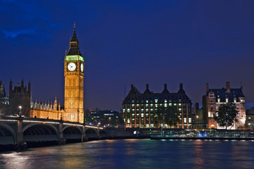 Fototapeta na wymiar Great Britain, London. View of the Clock Tower or Big Ben at dusk across the Thames River. 