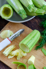 Raw zucchini on the table.