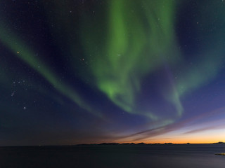Fototapeta premium Northern Lights over the colonial harbour. Nuuk, capital of Greenland.