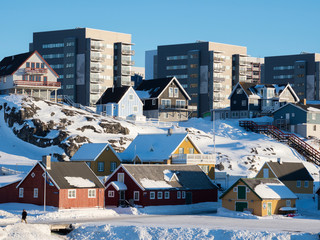 View over the old town and the colonial harbour towards the modern quarters of Nuuk, capital of Greenland.