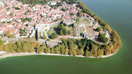 Aerial drone bird's eye view photo of iconic city and castle and mosque of Ioannina surounded by...
