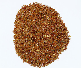 Flax seeds. Storage of flax seeds. Flax, essential oil culture. A handful of flax seeds.